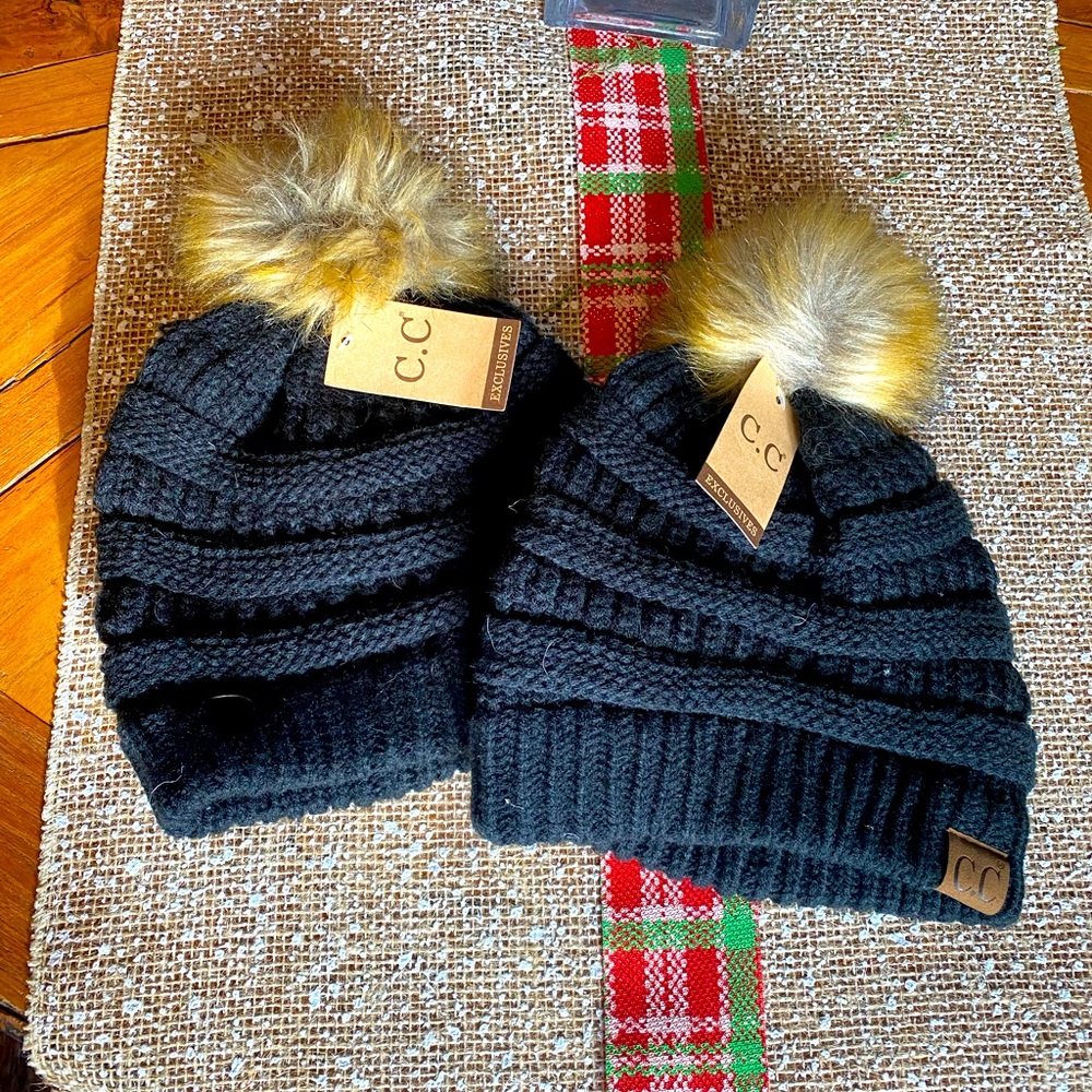 CC Beanies Black with Tans Pom Poms on top.